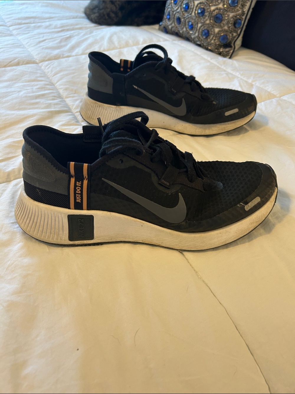 Nike Women’s Black and Gray Running Sneakers with Orange Accent